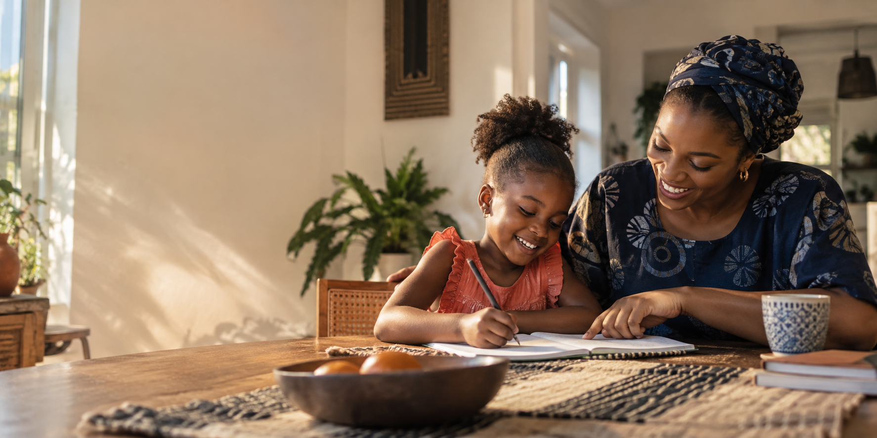 A mother and daughter learning together at home